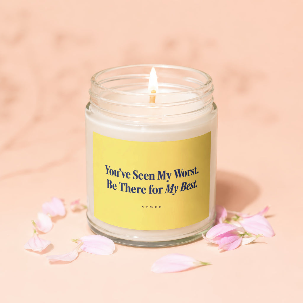 Jar candle with yellow label saying "You've Seen My Worst. Be There for My Best. VOWED."