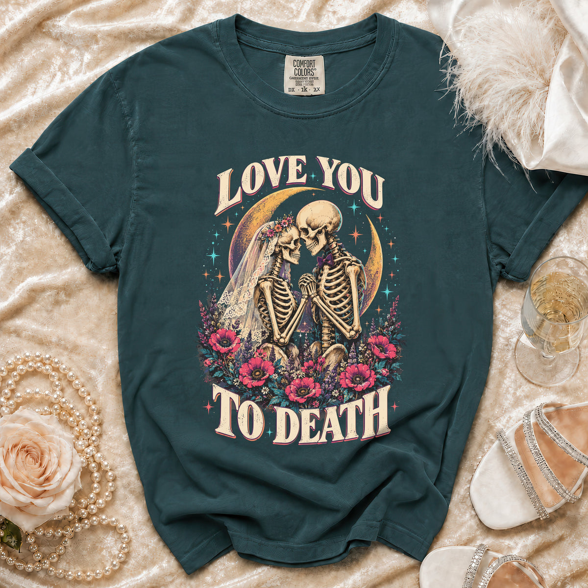 Dark teal t-shirt with "Love You To Death" text and skeleton couple graphic.