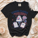 Black t-shirt with "Wedding Planner Because Therapy Is Expensive" text and graphics.