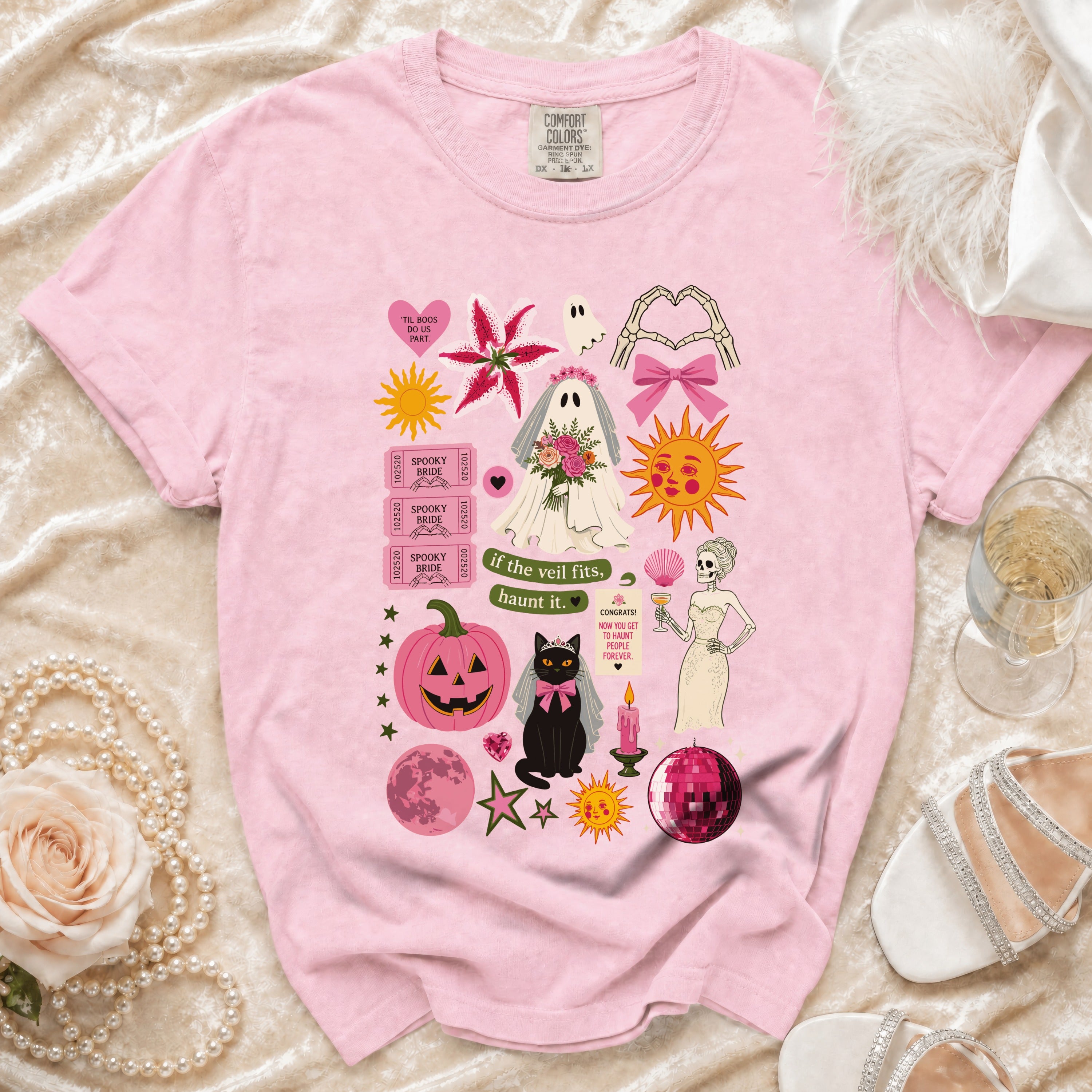 Pink t-shirt with "Spooky Bride" and Halloween-themed graphics.