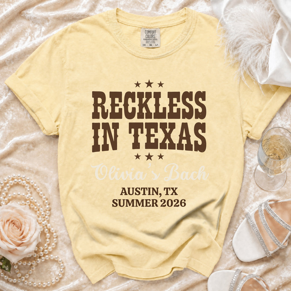 Yellow t-shirt with "Reckless in Texas" and "Olivia's Bach" for Austin, TX.