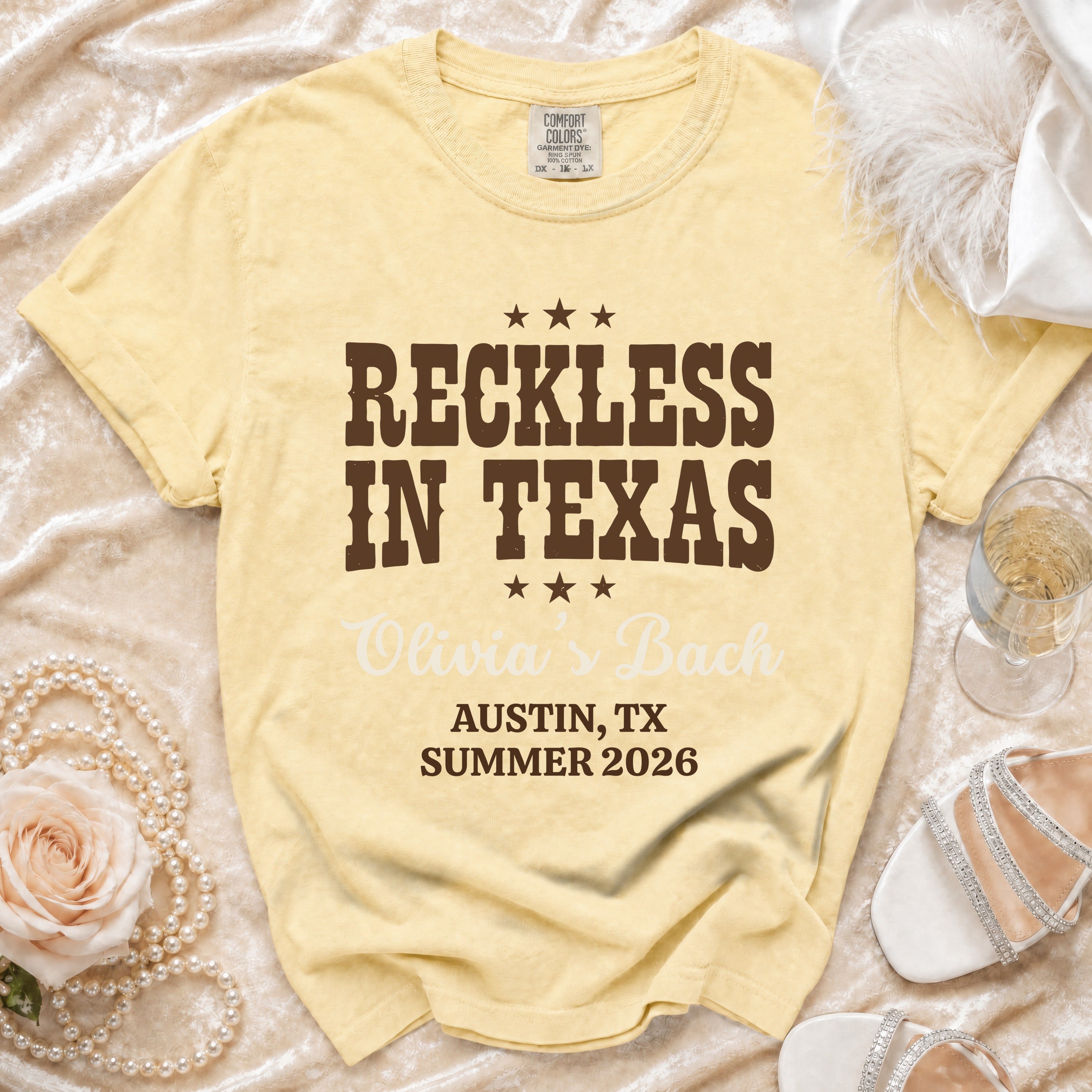 Yellow t-shirt with "Reckless in Texas" and "Olivia's Bach" for Austin, TX.