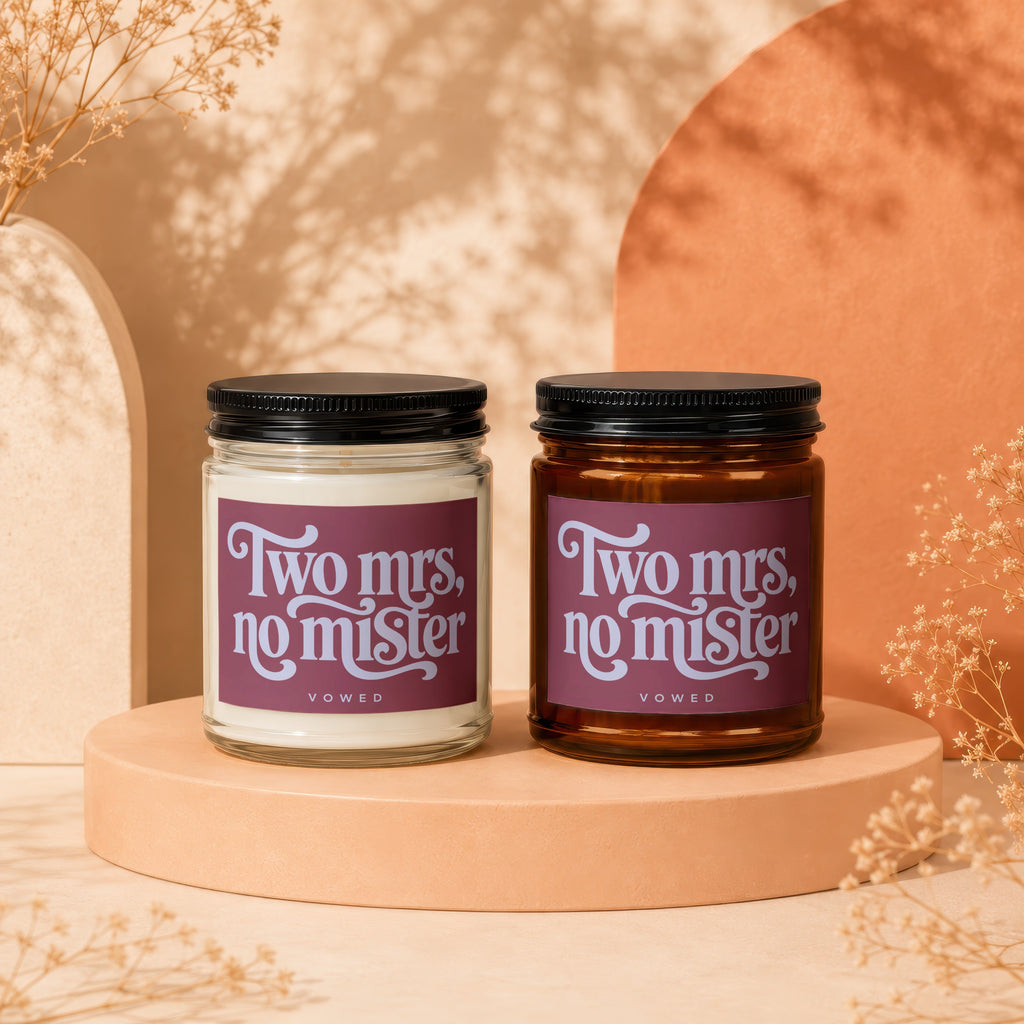 Two candles with "Two mrs, no mister" text and "VOWED" below.