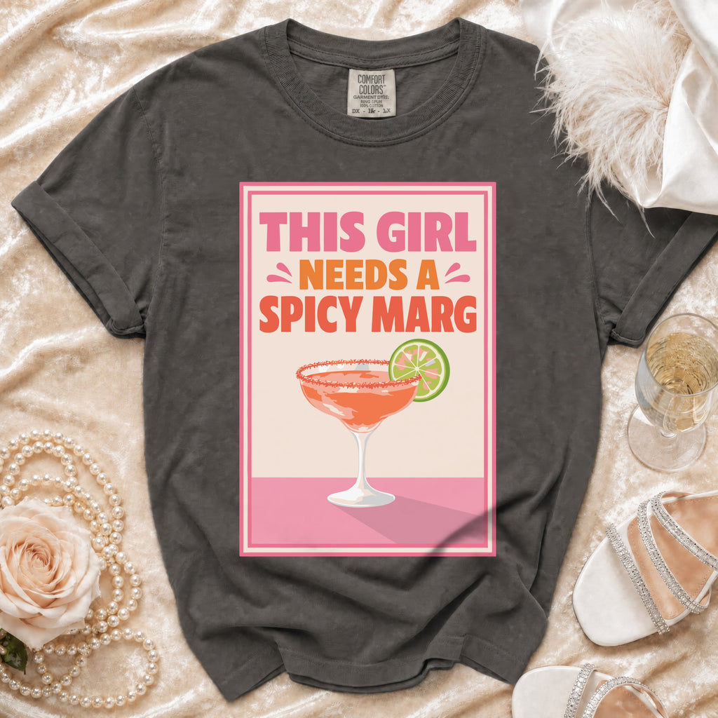 Gray t-shirt with "This Girl Needs a Spicy Marg" text and margarita graphic.