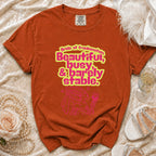 Orange t-shirt with "Bride of Frankenstein, Beautiful, busy, & barely stable." text.
