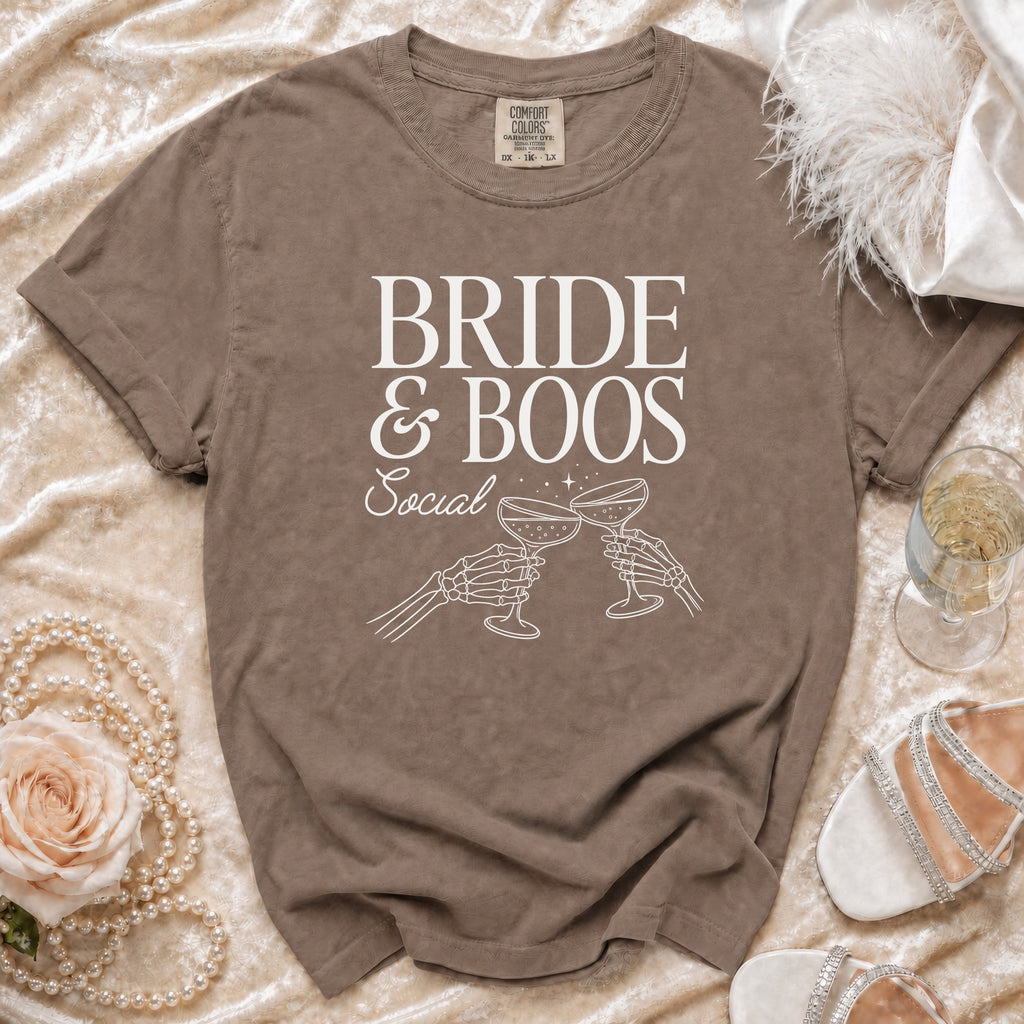 T-shirt with "Bride & Boos Social" text and skeleton hands clinking glasses.
