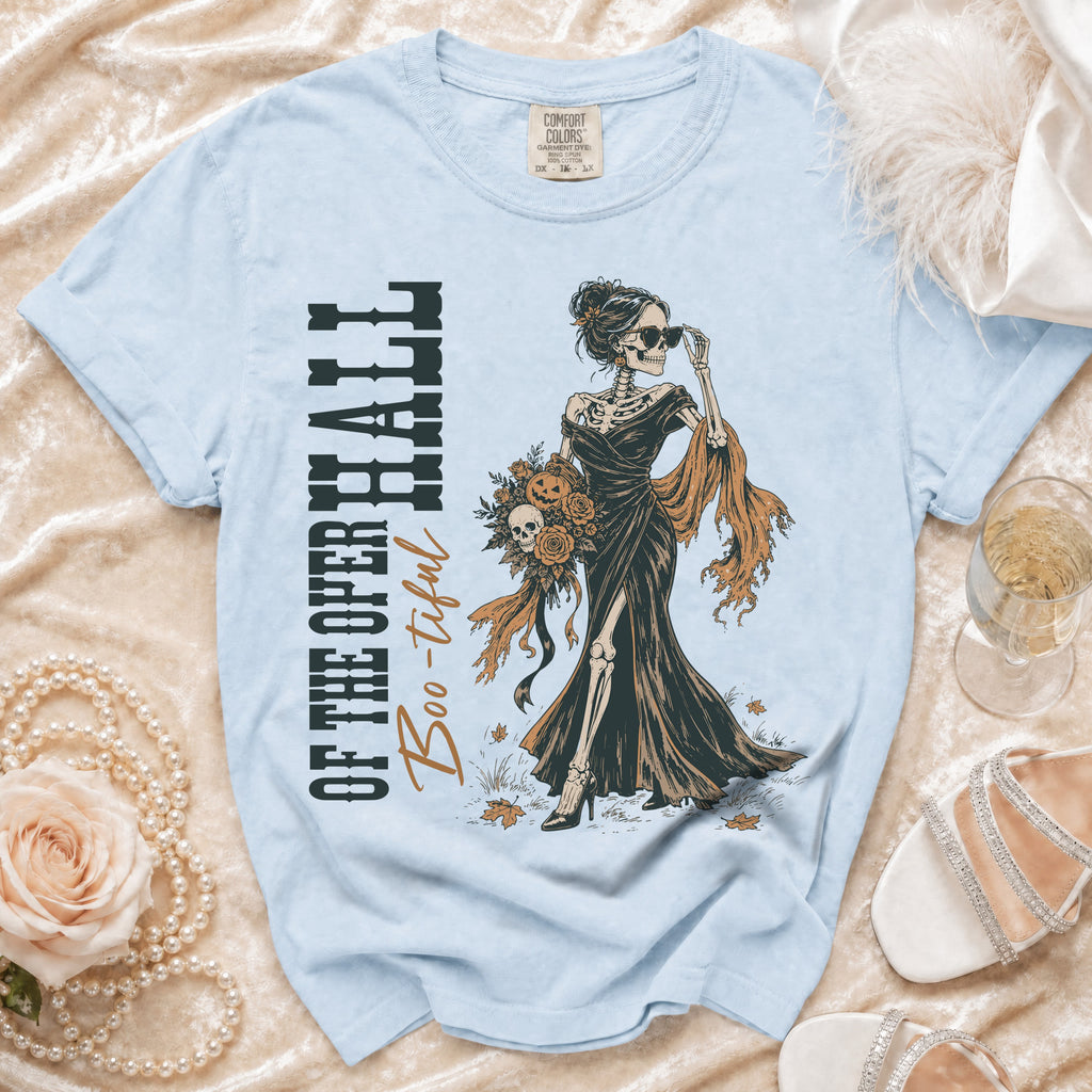 Light blue t-shirt with skeleton woman graphic and text "OF THE OPER HALL Boo-tiful".