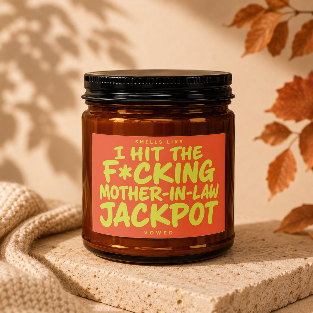 Candle labeled "Smells like I hit the f*cking mother-in-law jackpot."