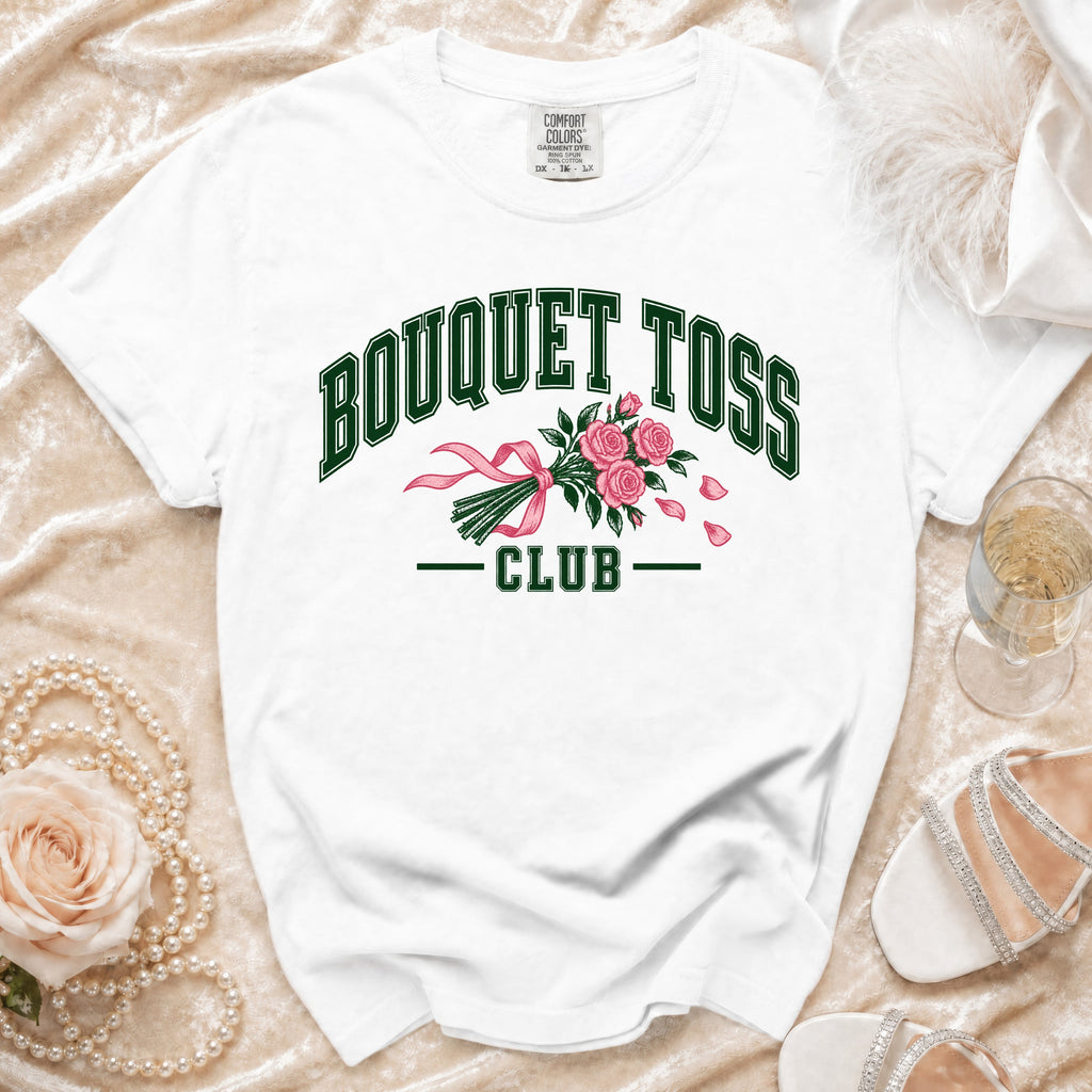 White t-shirt with "BOUQUET TOSS CLUB" text and rose bouquet graphic.