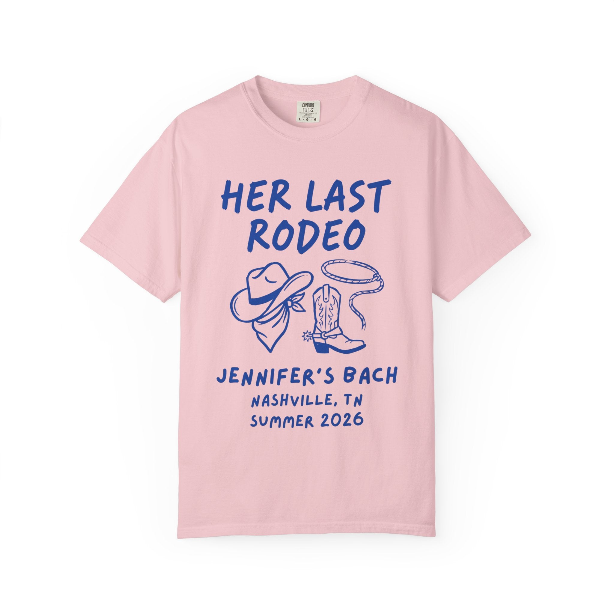 Pink t-shirt with "HER LAST RODEO" graphic, cowboy hat, rope, and boots.