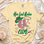 Yellow t-shirt with "Her Last Rodeo" and cowboy boots graphic.