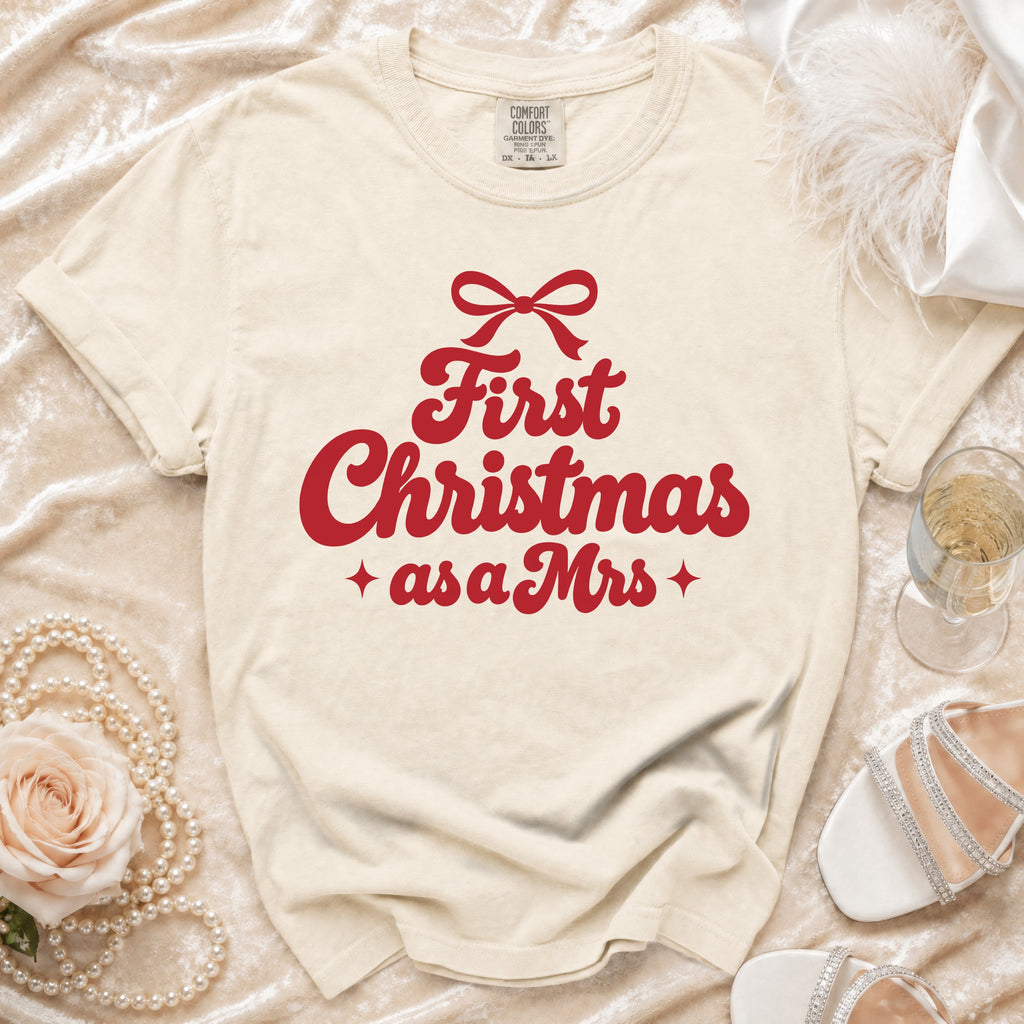Cream t-shirt with red text "First Christmas as a Mrs" and a bow.