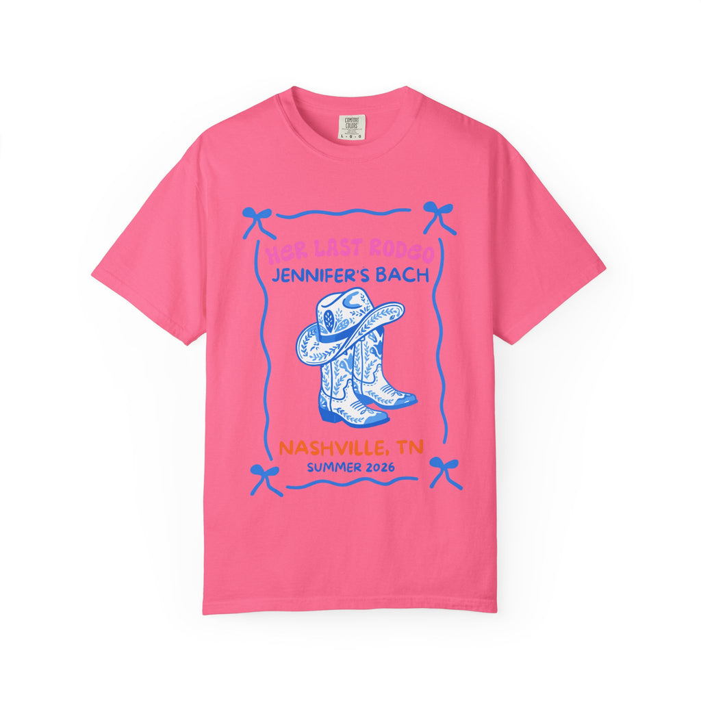 Pink t-shirt with "Her Last Rodeo" and cowboy boots graphic.