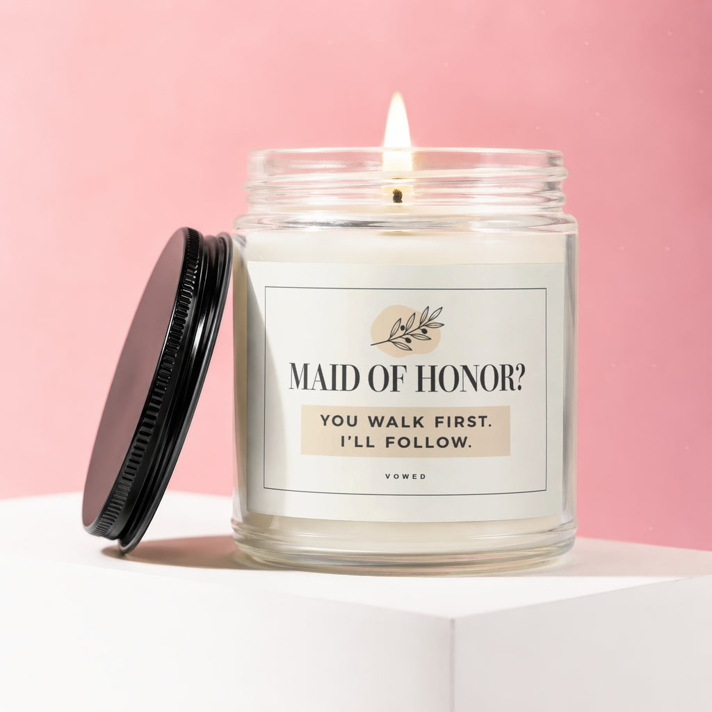 Lit jar candle with "Maid of Honor? You walk first. I'll follow." text.