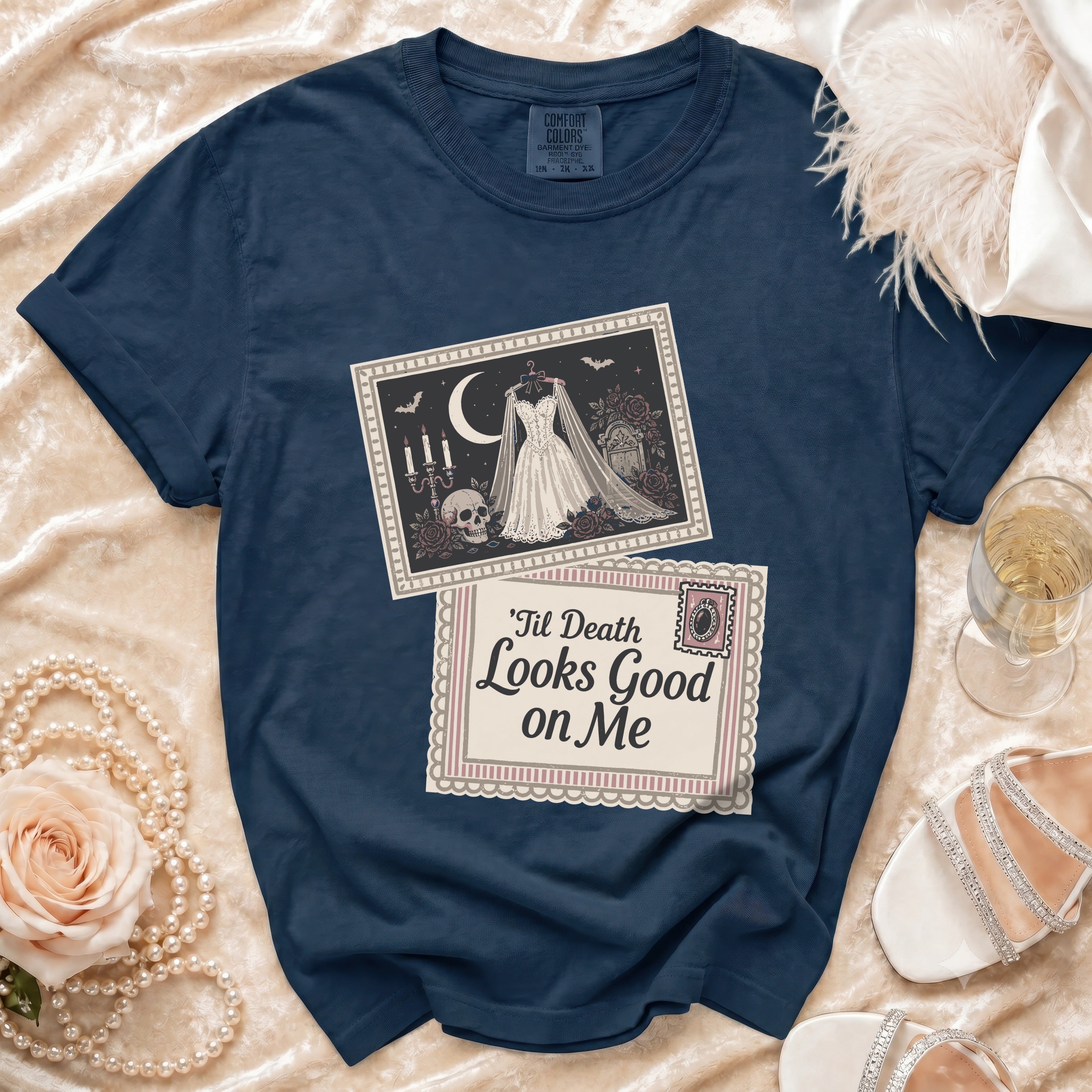 Navy t-shirt with "Til Death Looks Good on Me" graphic and wedding dress imagery.