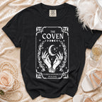 Black t-shirt with "The Coven Patricia's Bachelorette" text and celestial graphic.