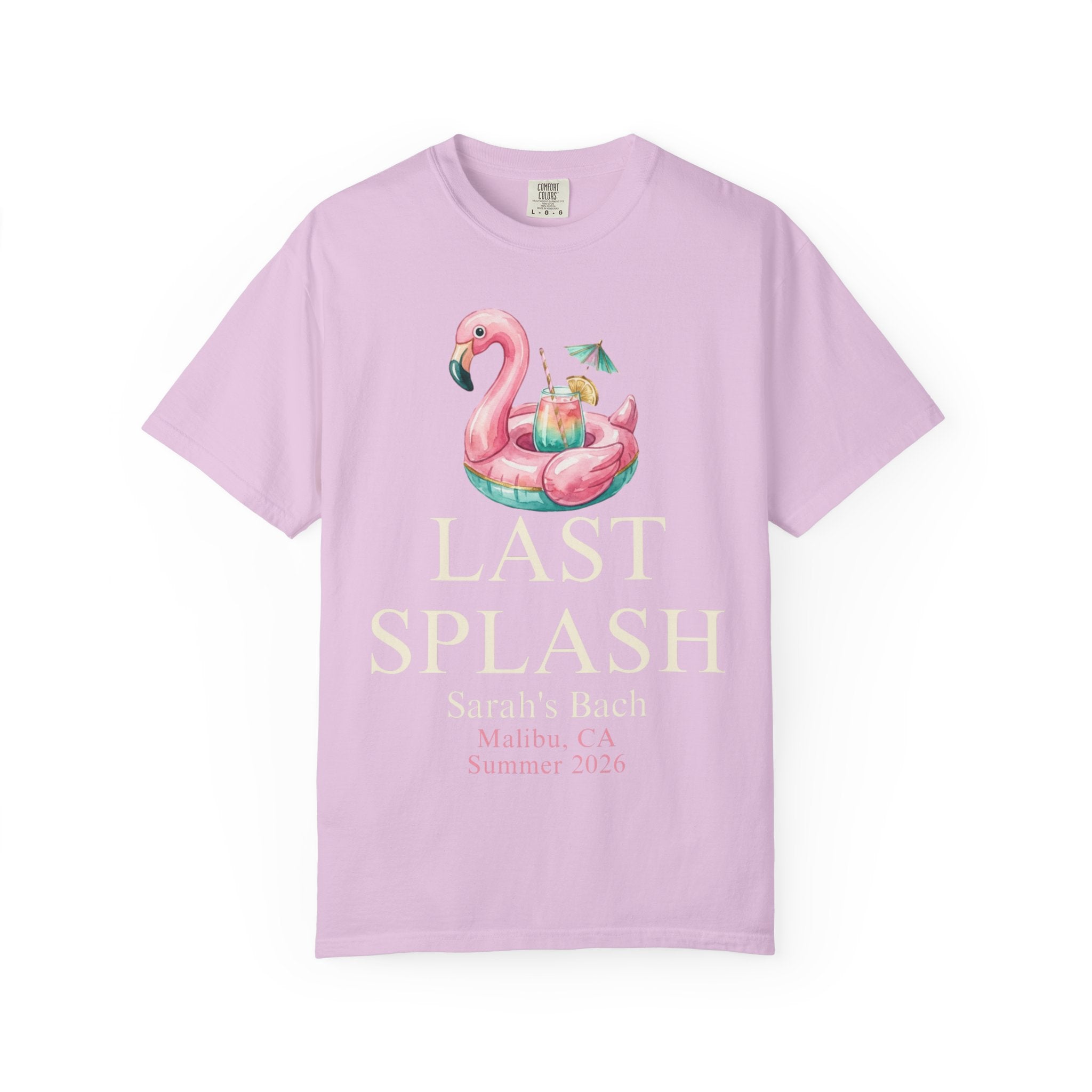 Pink t-shirt with a flamingo float graphic and "LAST SPLASH Sarah's Bach Summer 2026" text.