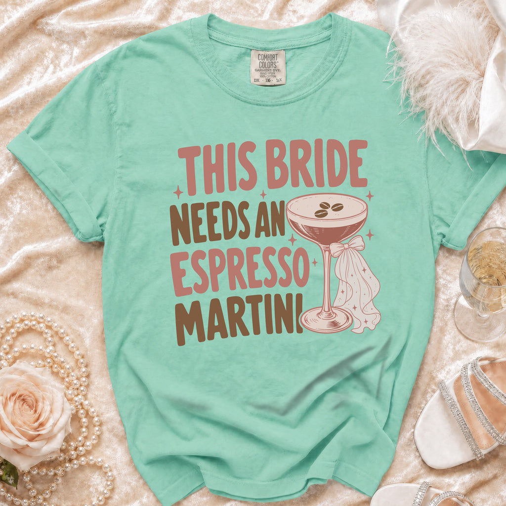 Mint t-shirt with "This bride needs an espresso martini" text and martini glass graphic.