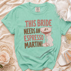 Mint t-shirt with "This bride needs an espresso martini" text and martini glass graphic.