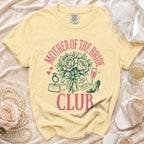 Yellow t-shirt with "Mother of the Bride Club" text, a bouquet, and wedding accessories.