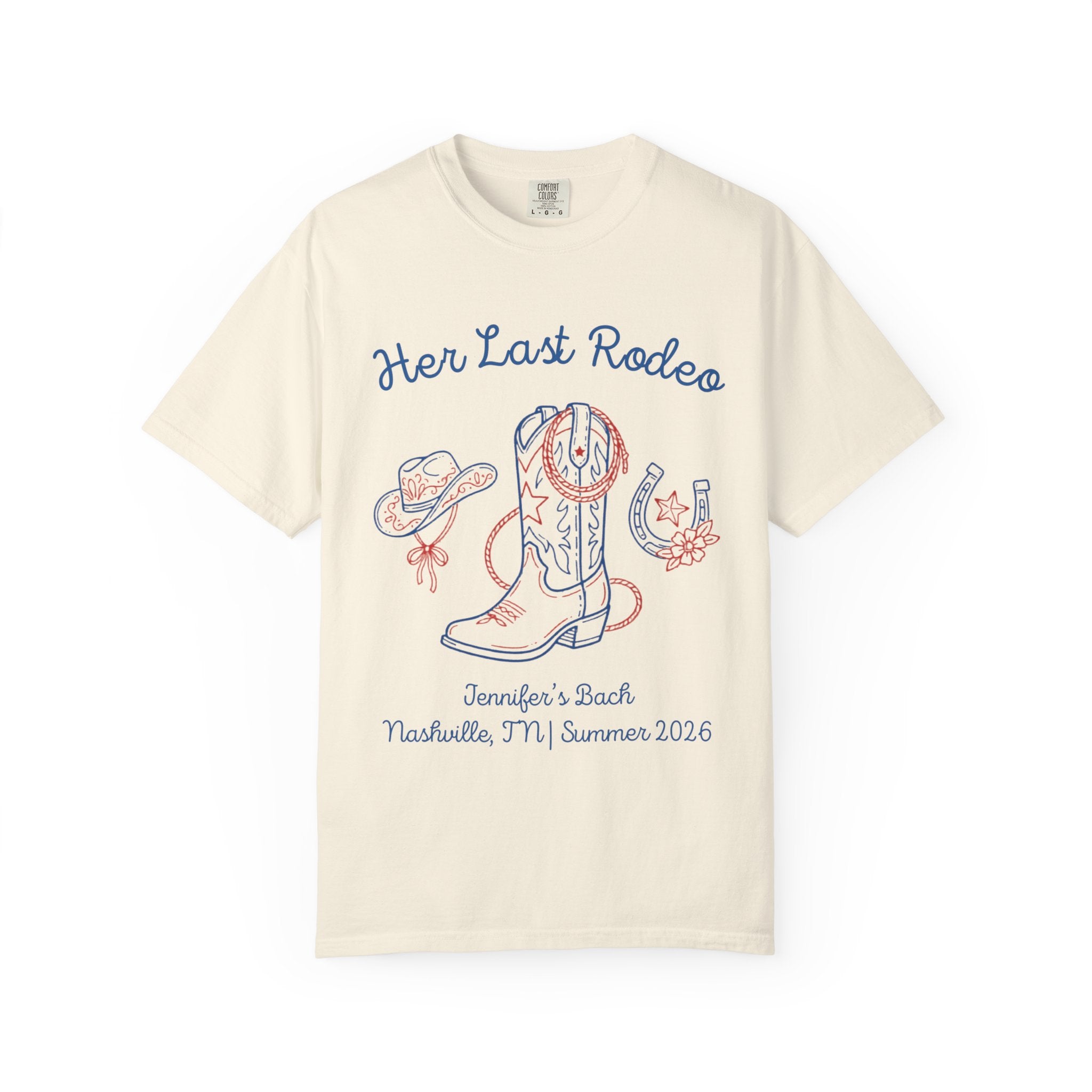 Cream t-shirt with "Her Last Rodeo" and Western graphics.