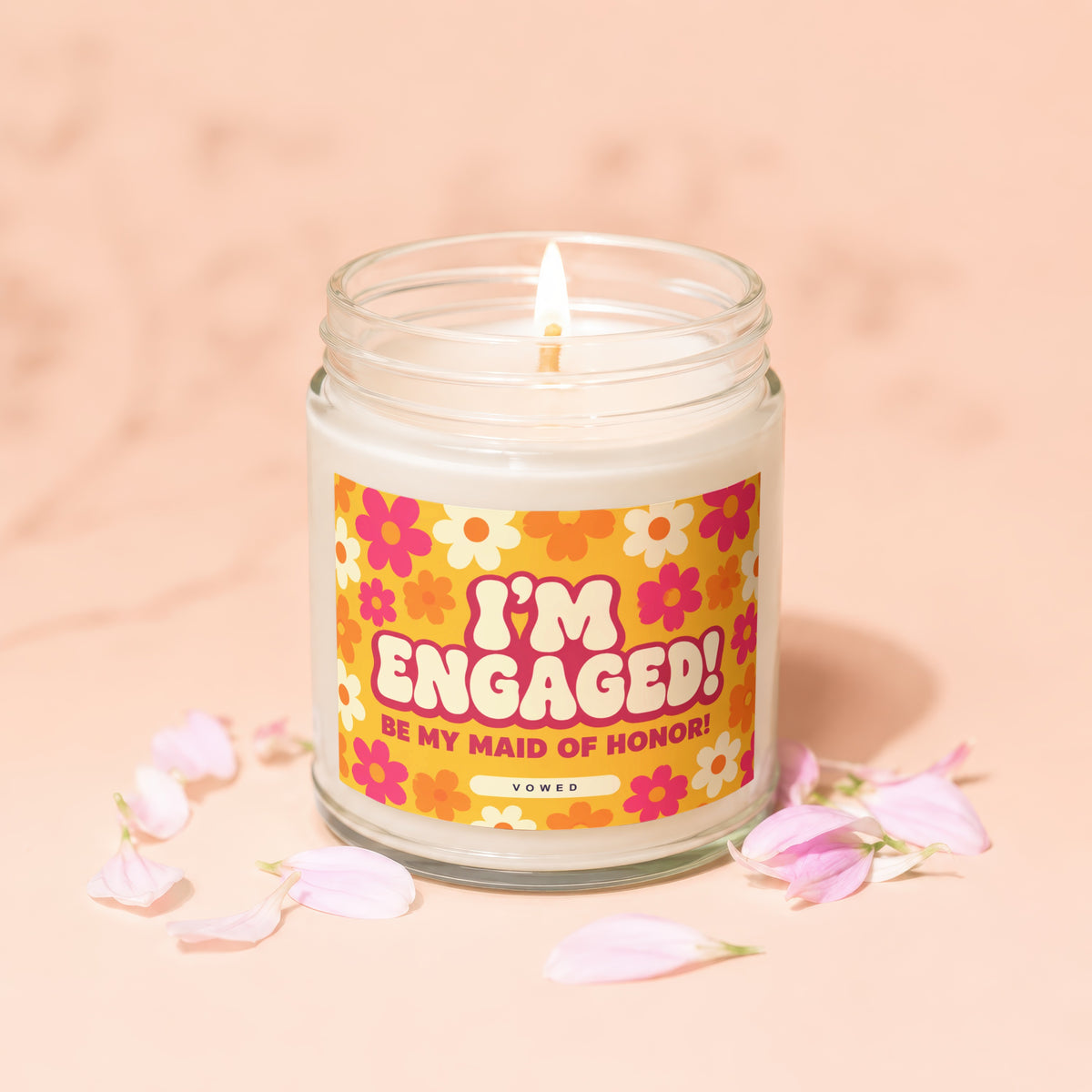 Candle with "I'm Engaged! Be My Maid of Honor!" text and floral design.
