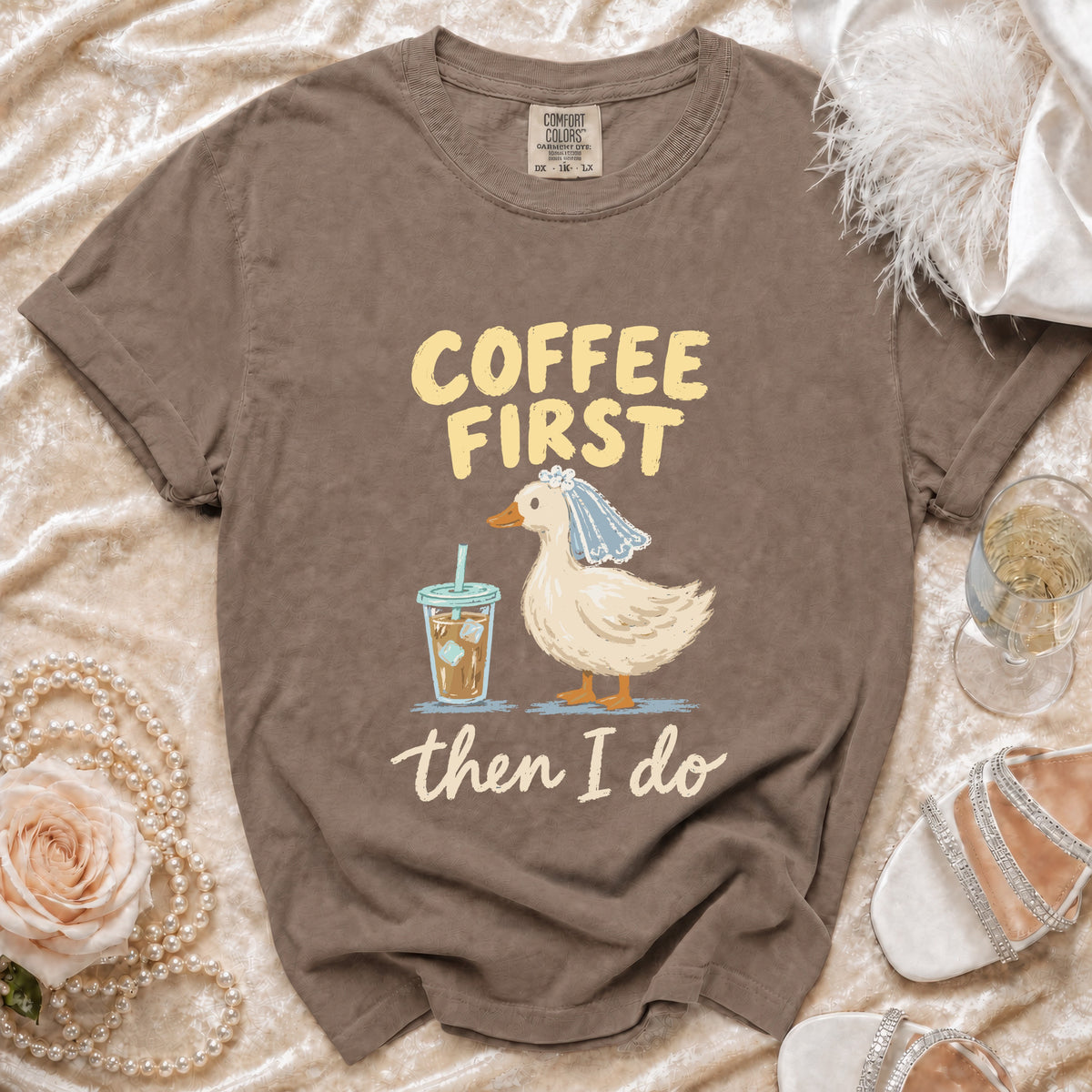 Brown t-shirt with "Coffee First then I Do" text and a duck wearing a veil.