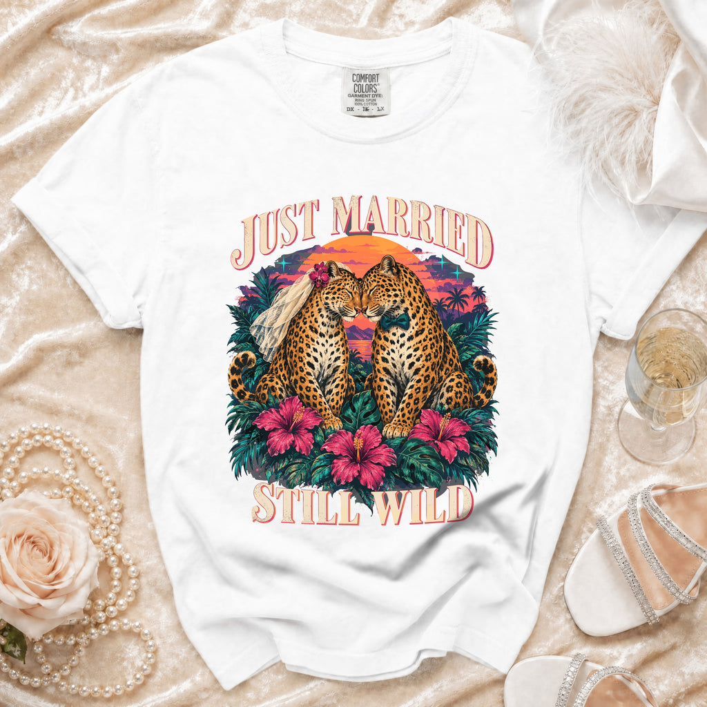 White t-shirt with leopards wearing a veil and bowtie, saying "Just Married Still Wild".