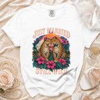White t-shirt with leopards wearing a veil and bowtie, saying "Just Married Still Wild".