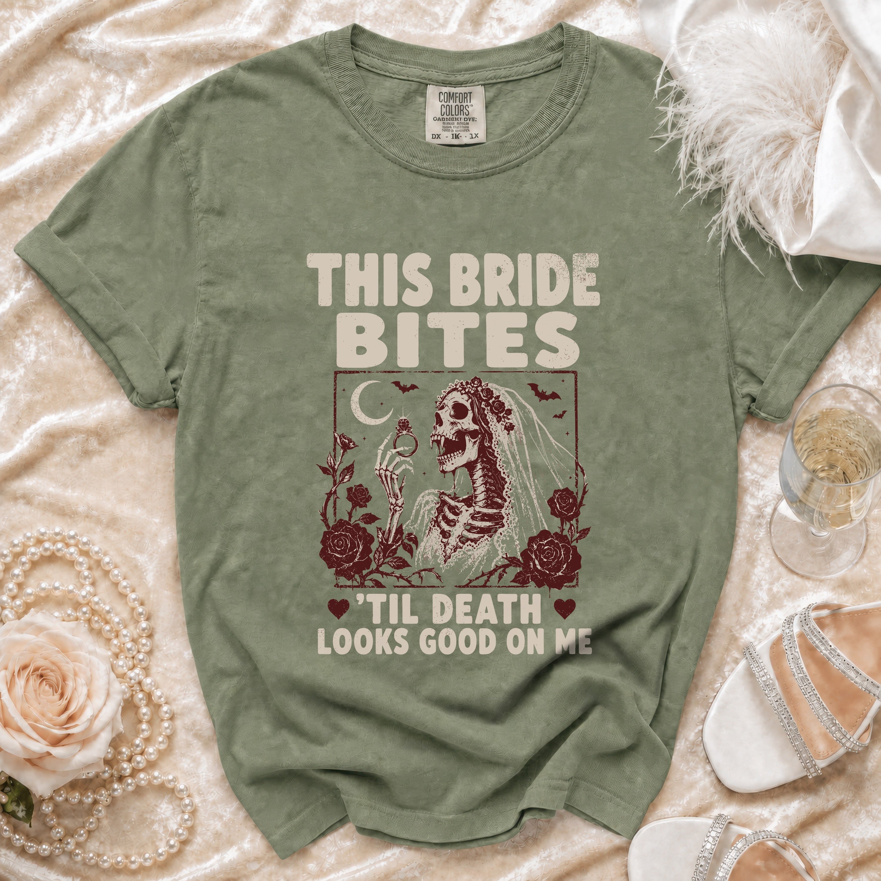 T-shirt with text "This Bride Bites 'Til Death Looks Good On Me" featuring a skeleton bride.