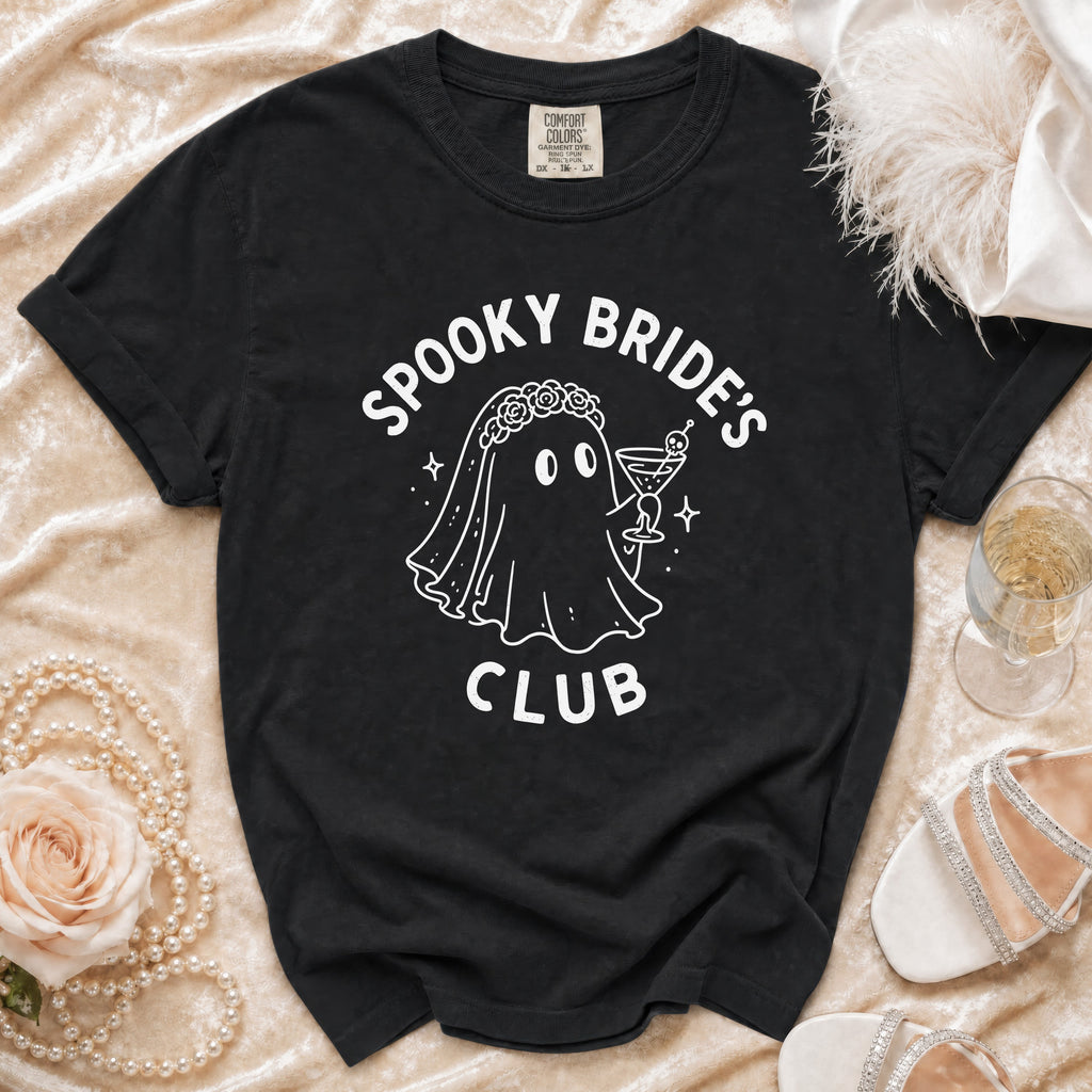 Black t-shirt with "Spooky Bride's Club" ghost graphic and festive accessories.