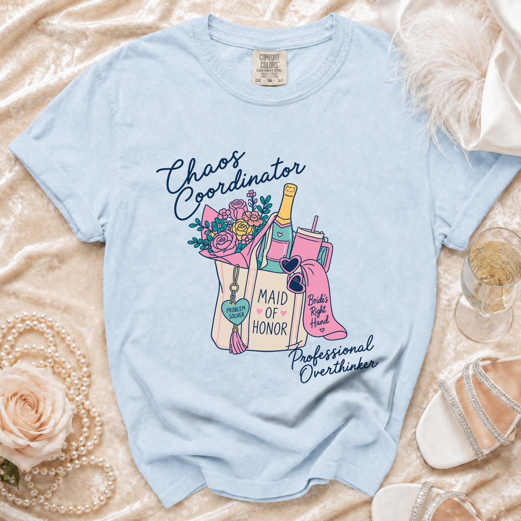 Light blue t-shirt with "Chaos Coordinator" and "Maid of Honor" graphics.