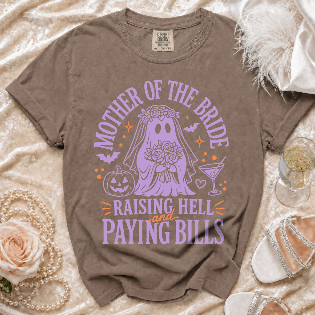 T-shirt with purple ghost bride graphic saying "Mother of the Bride Raising Hell and Paying Bills".