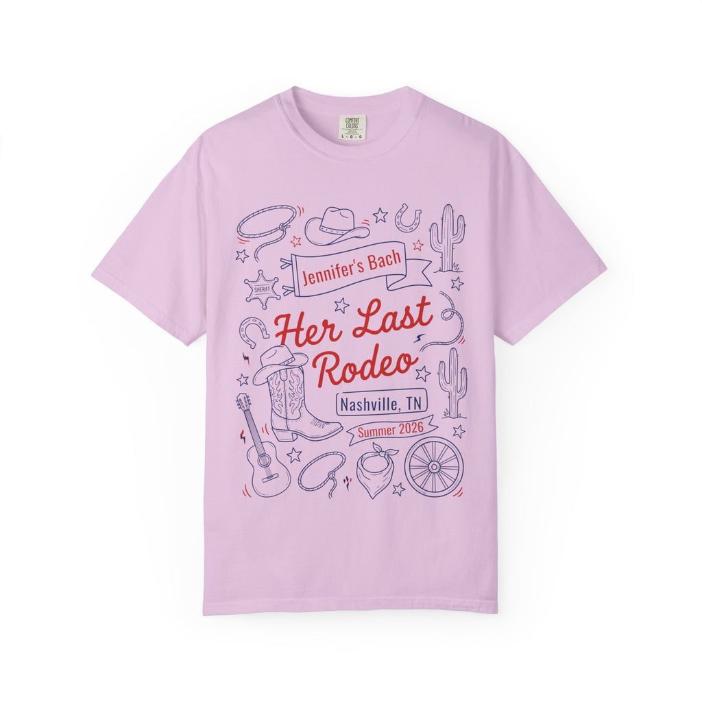 Pink t-shirt with "Her Last Rodeo Nashville, TN Summer 2026" text and western graphics.