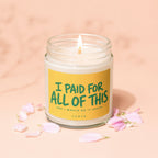 Glass jar candle, lit, with text "I PAID FOR ALL OF THIS AND I WOULD DO IT AGAIN VOWED".
