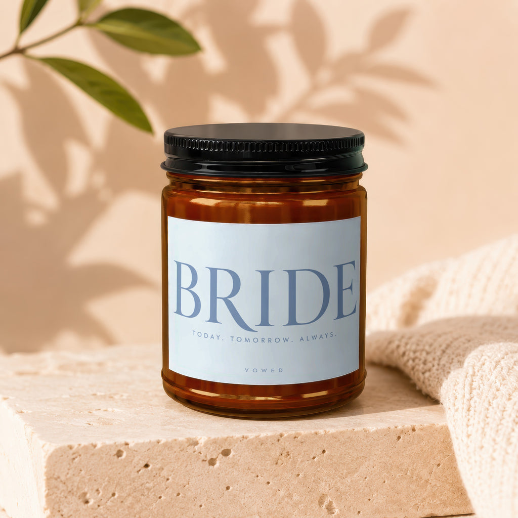 Amber candle with a "BRIDE TODAY. TOMORROW. ALWAYS. VOWED" label.