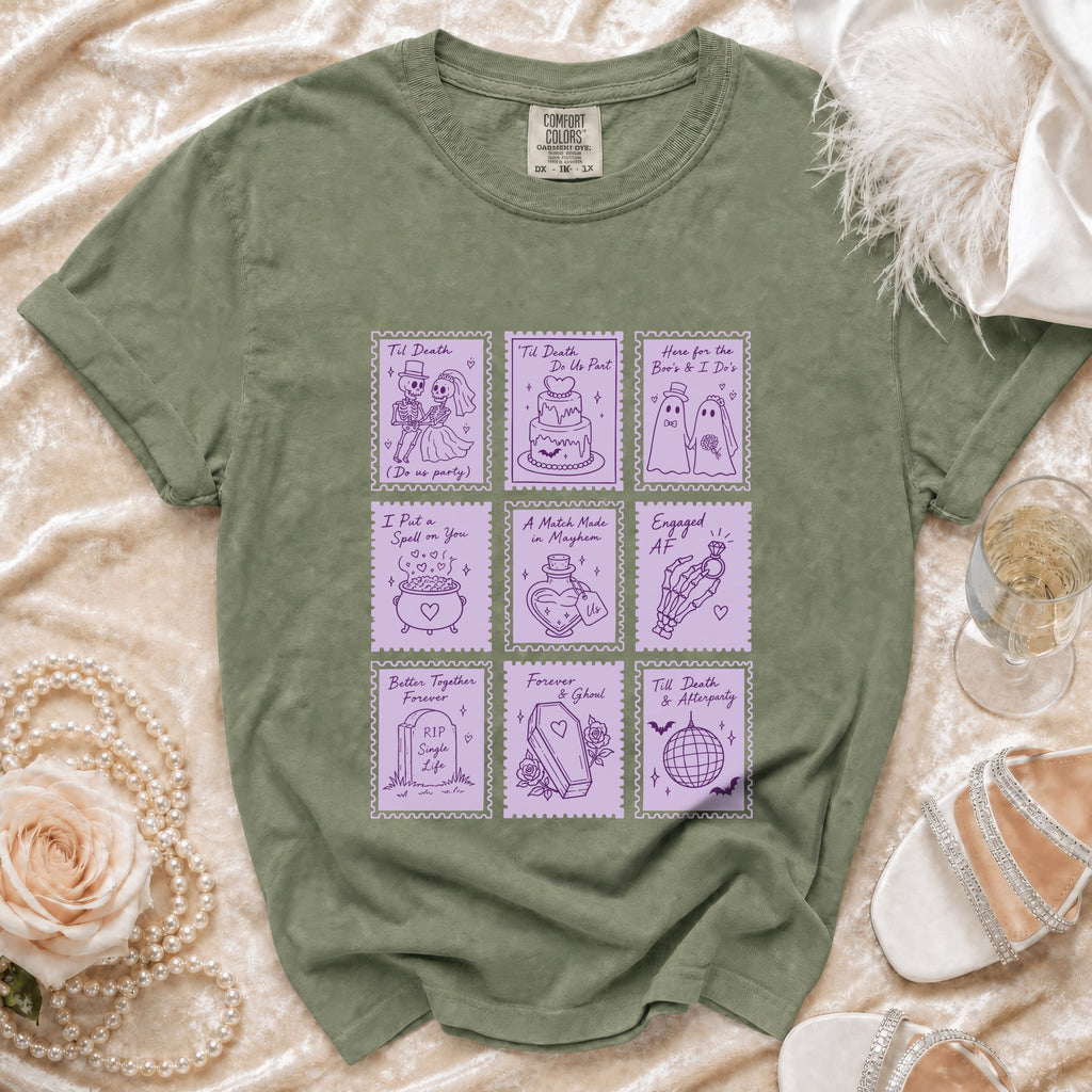 Green t-shirt with purple graphic of nine stamps with wedding and spooky themes.