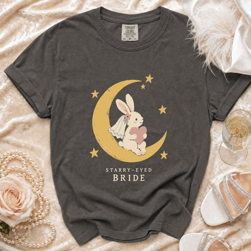 Dark grey t-shirt with a moon, bunny, and stars graphic reading "Starry-Eyed Bride".