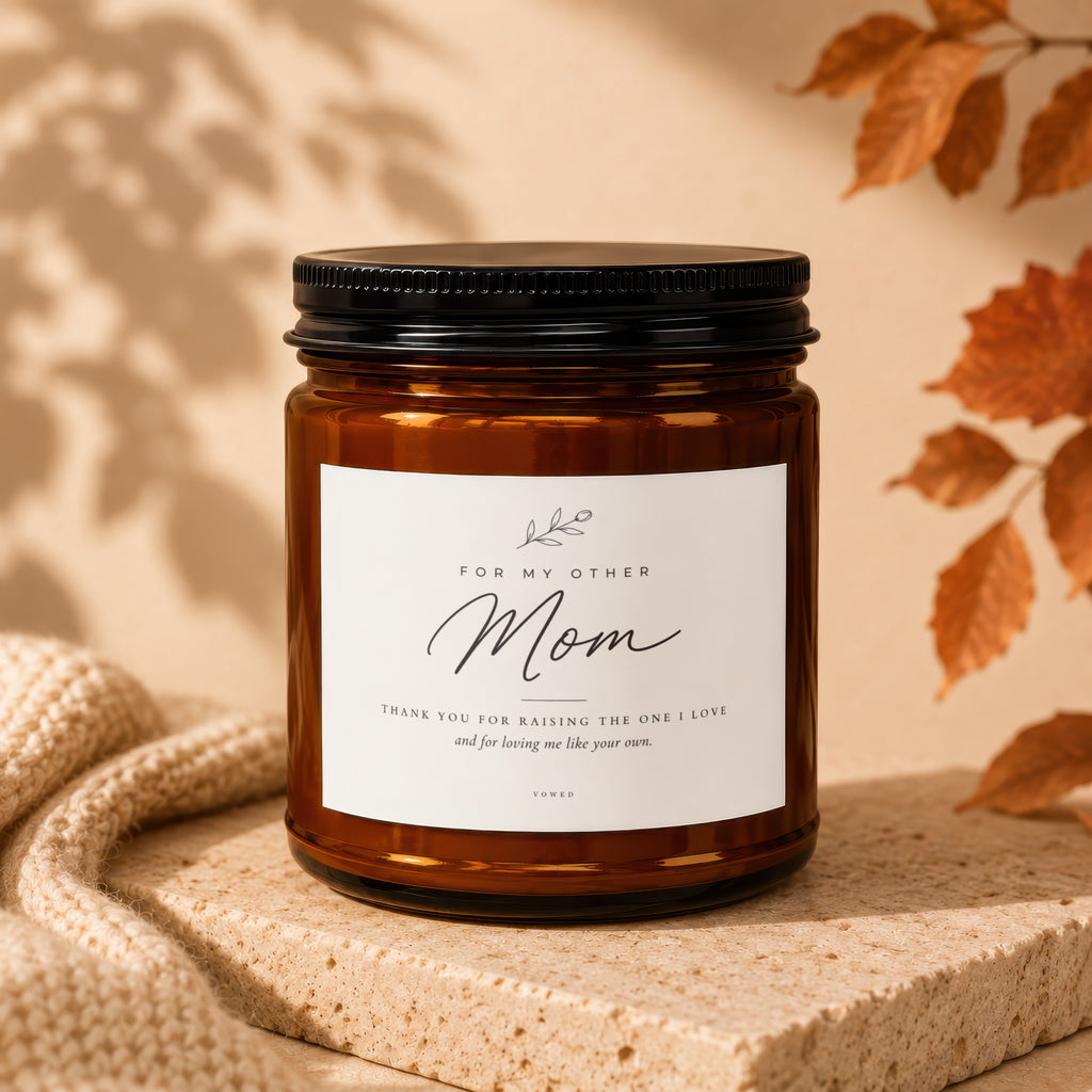 Amber candle with a white label for "Mom" reads "Thank you for raising the one I love."
