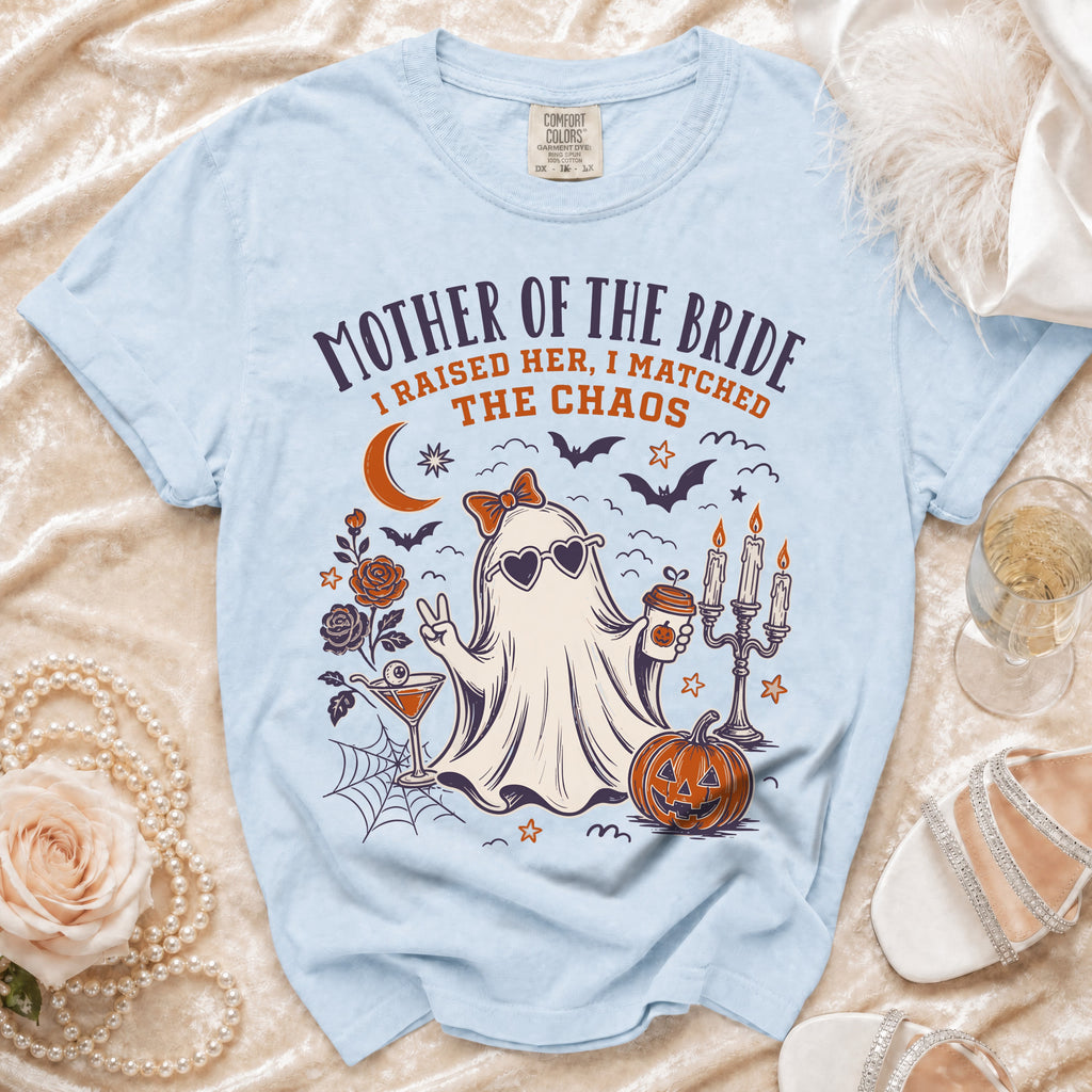 Light blue t-shirt with "Mother of the Bride, I Raised Her, I Matched The Chaos" text and ghost graphic.