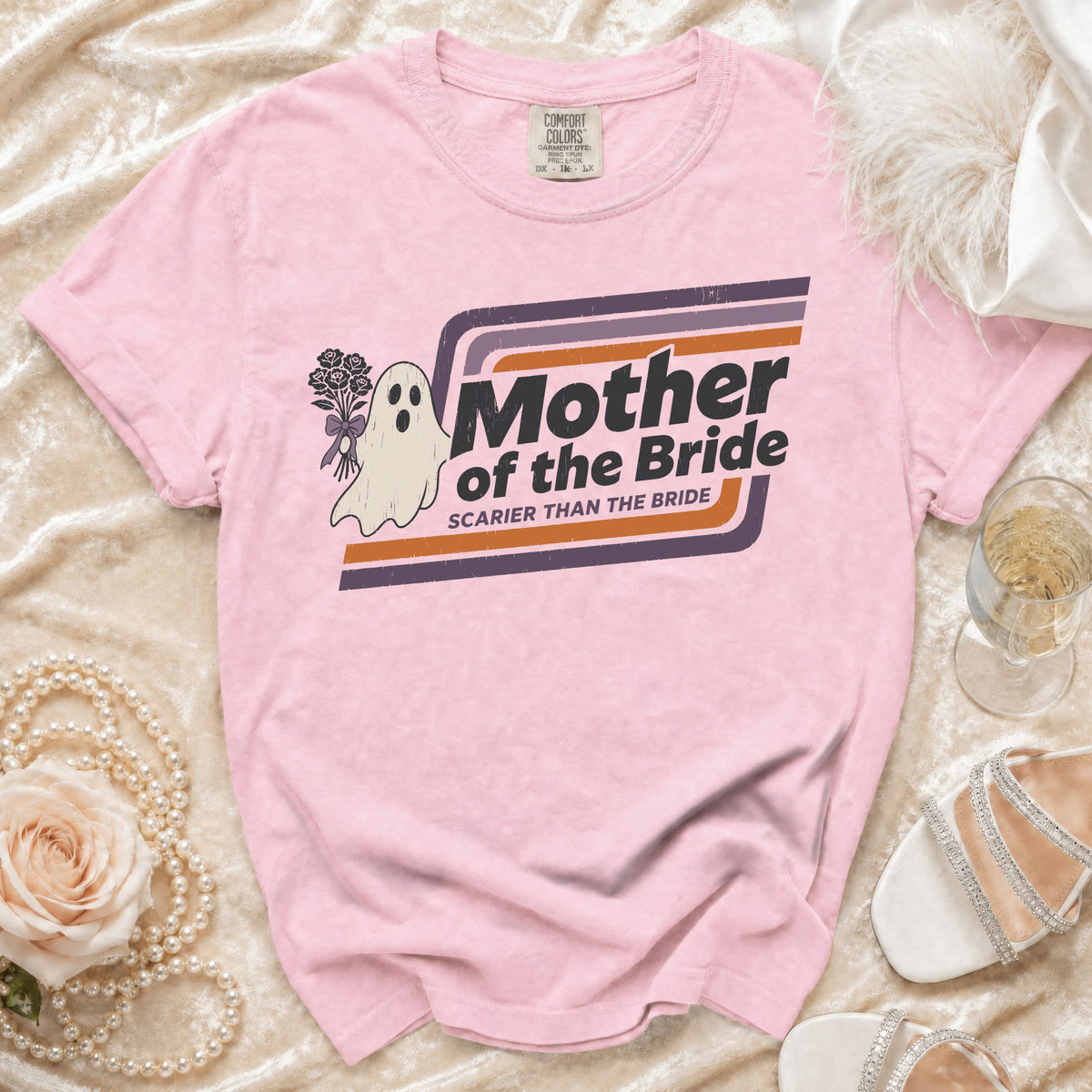 Pink t-shirt with "Mother of the Bride Scarier Than the Bride" ghost graphic.