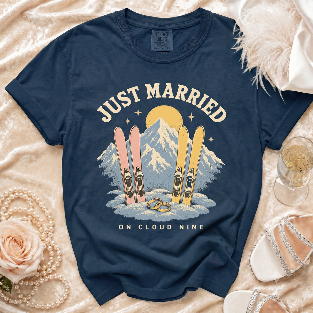 Dark blue t-shirt with "JUST MARRIED ON CLOUD NINE" text and ski graphic.