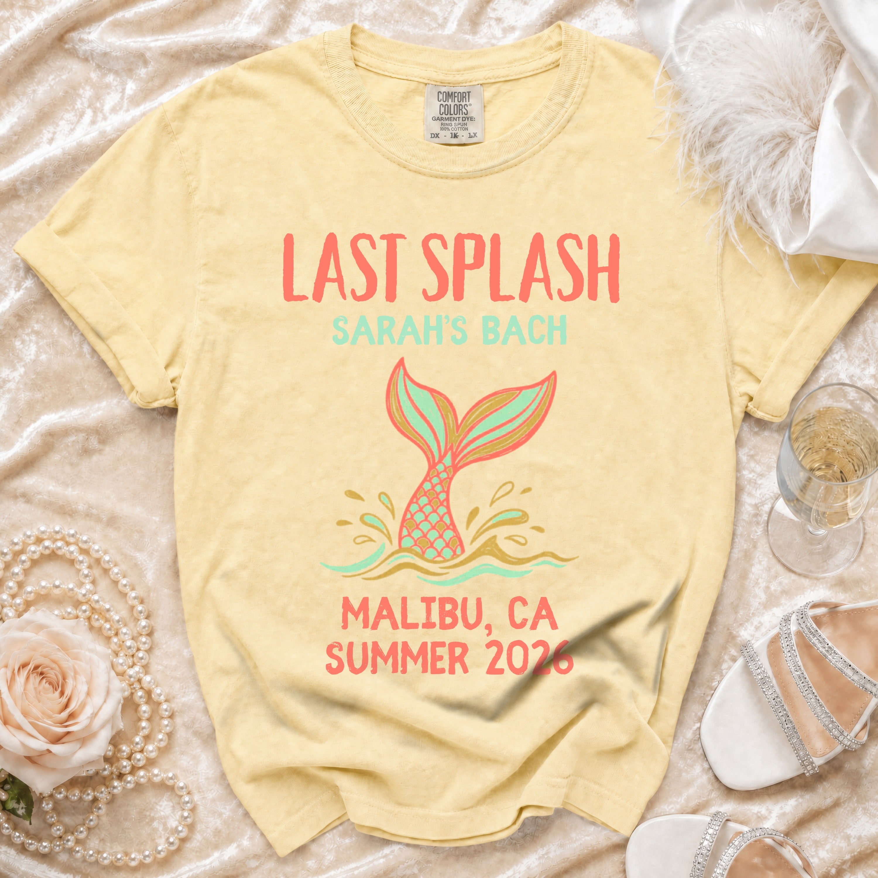 Yellow t-shirt with "Last Splash Sarah's Bach Malibu, CA Summer 2026" and mermaid tail.