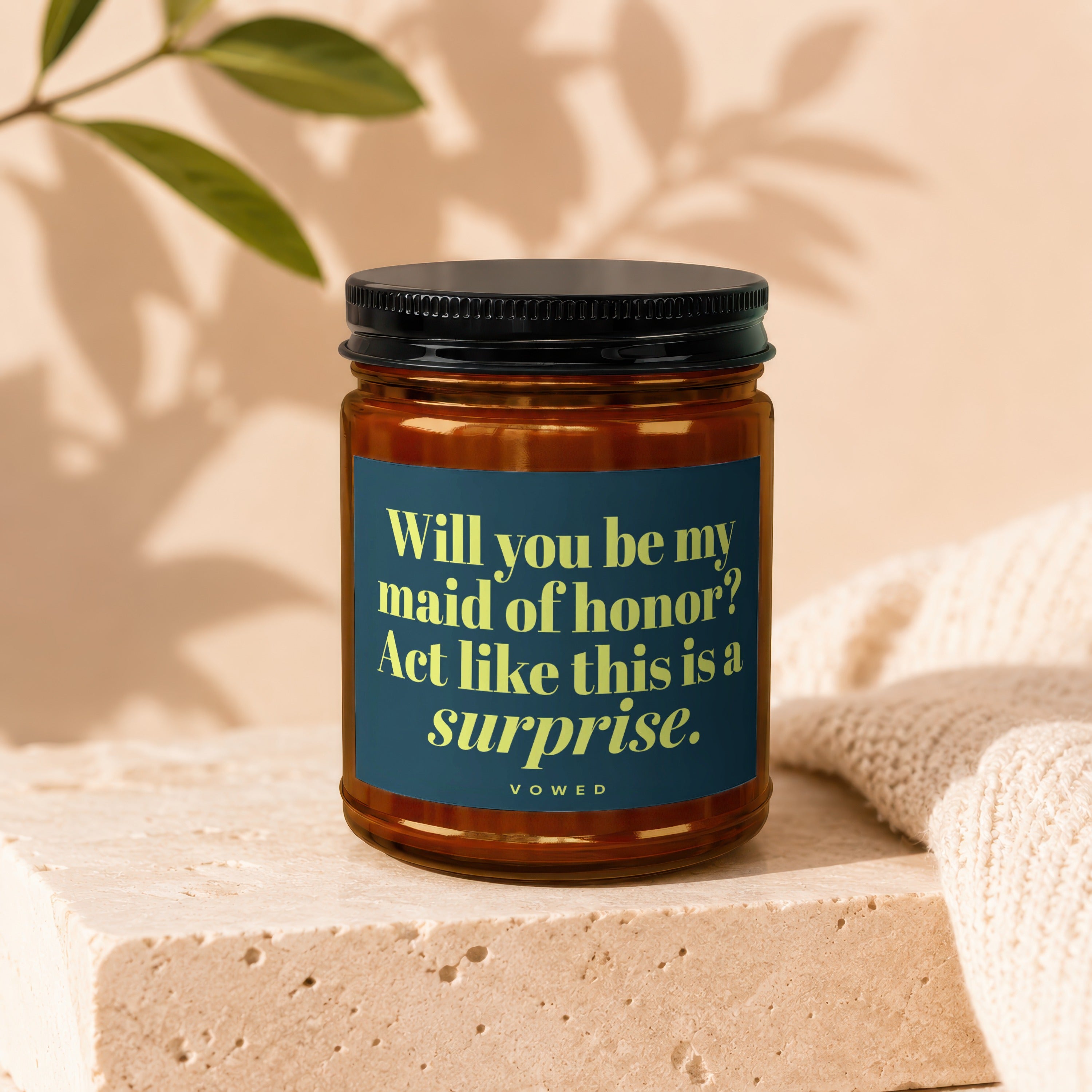 Candle with text "Will you be my maid of honor? Act like this is a surprise."