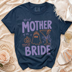 Navy Comfort Colors shirt with "Official Mother of the Bride" text and Halloween graphics.