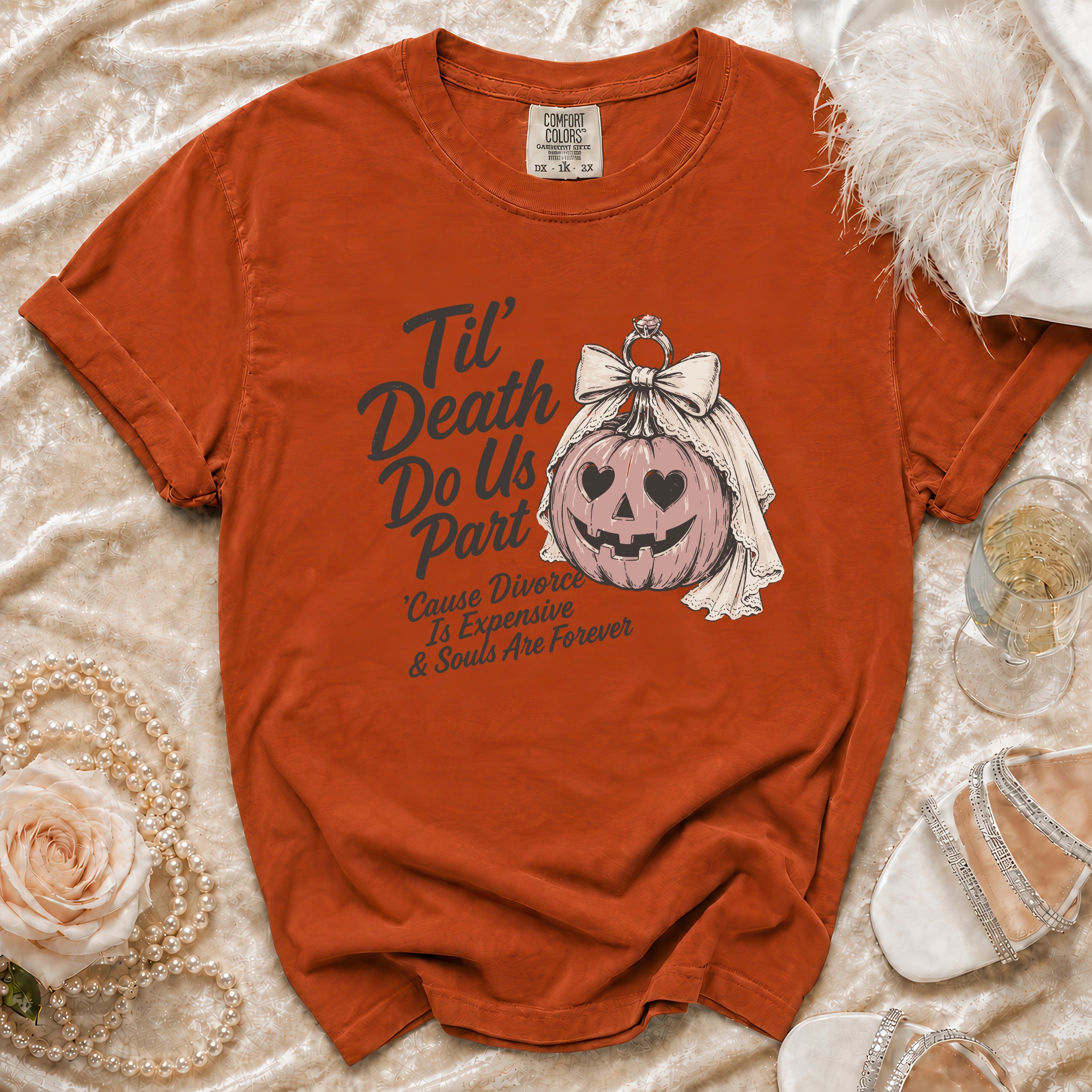 Orange t-shirt with a graphic of a pumpkin bride and text 'Til Death Do Us Part'.