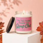 Jar candle with pink label reading "The Yes Heard Round the Group Chat".