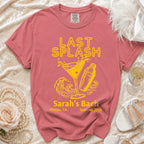 Salmon t-shirt with "LAST SPLASH" text, martini glass, shaker, and waves.
