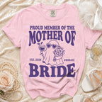 Pink t-shirt with "Proud Member of the Mother of Bride" graphic.