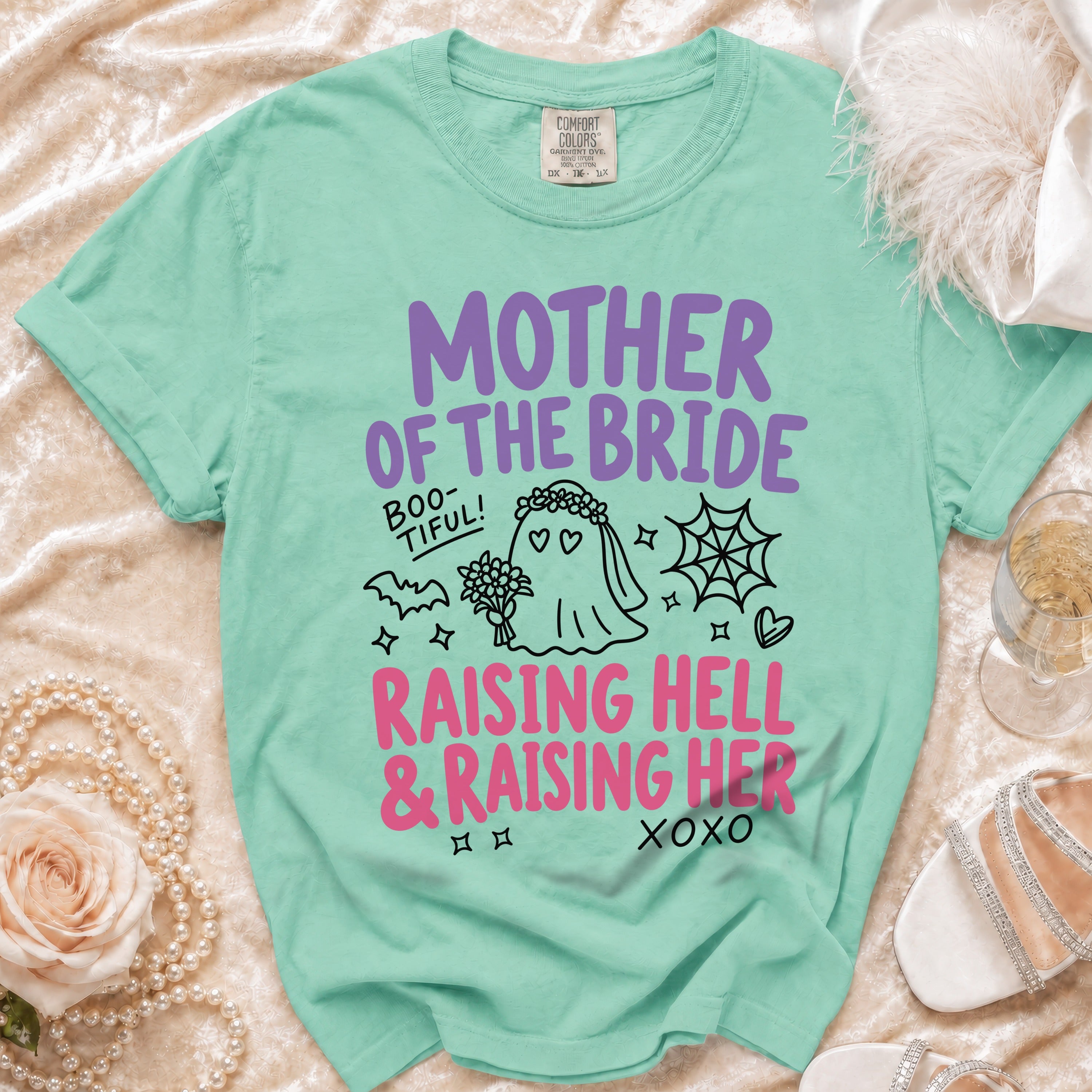 Mint t-shirt with "Mother of the Bride" and ghost graphics.
